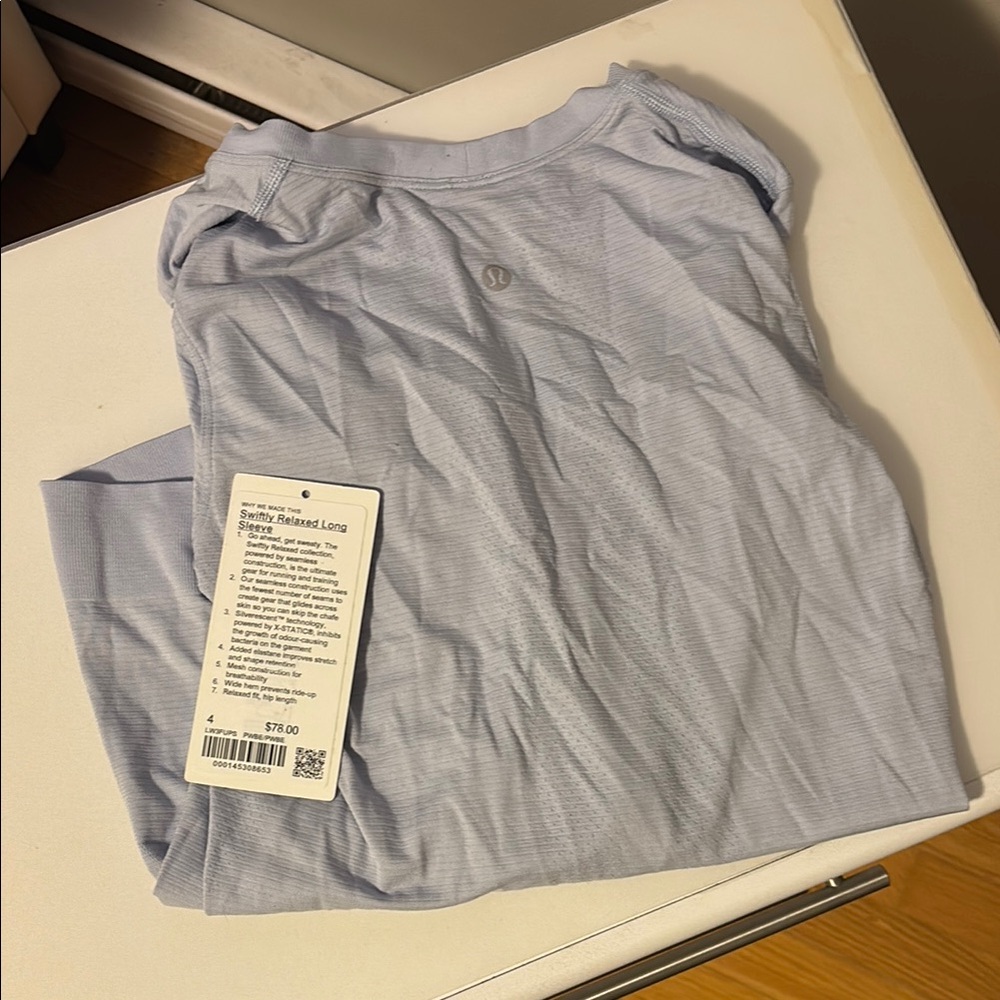 Lululemon powder blue swiftly, size 4 originally $78. This colour is rare.